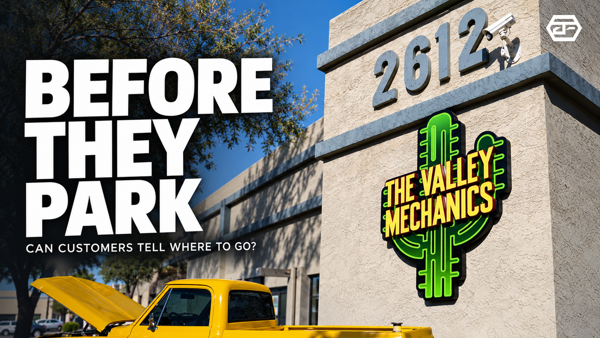 Auto repair shop signage shown with parking, service bays, and customer entrance