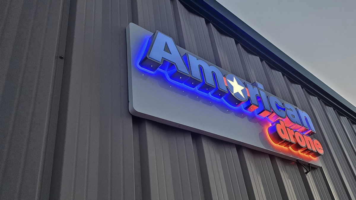 american drone retail location with custom 3d signage