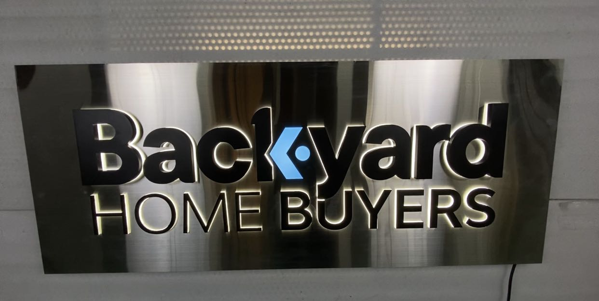 backyard home buyers logo