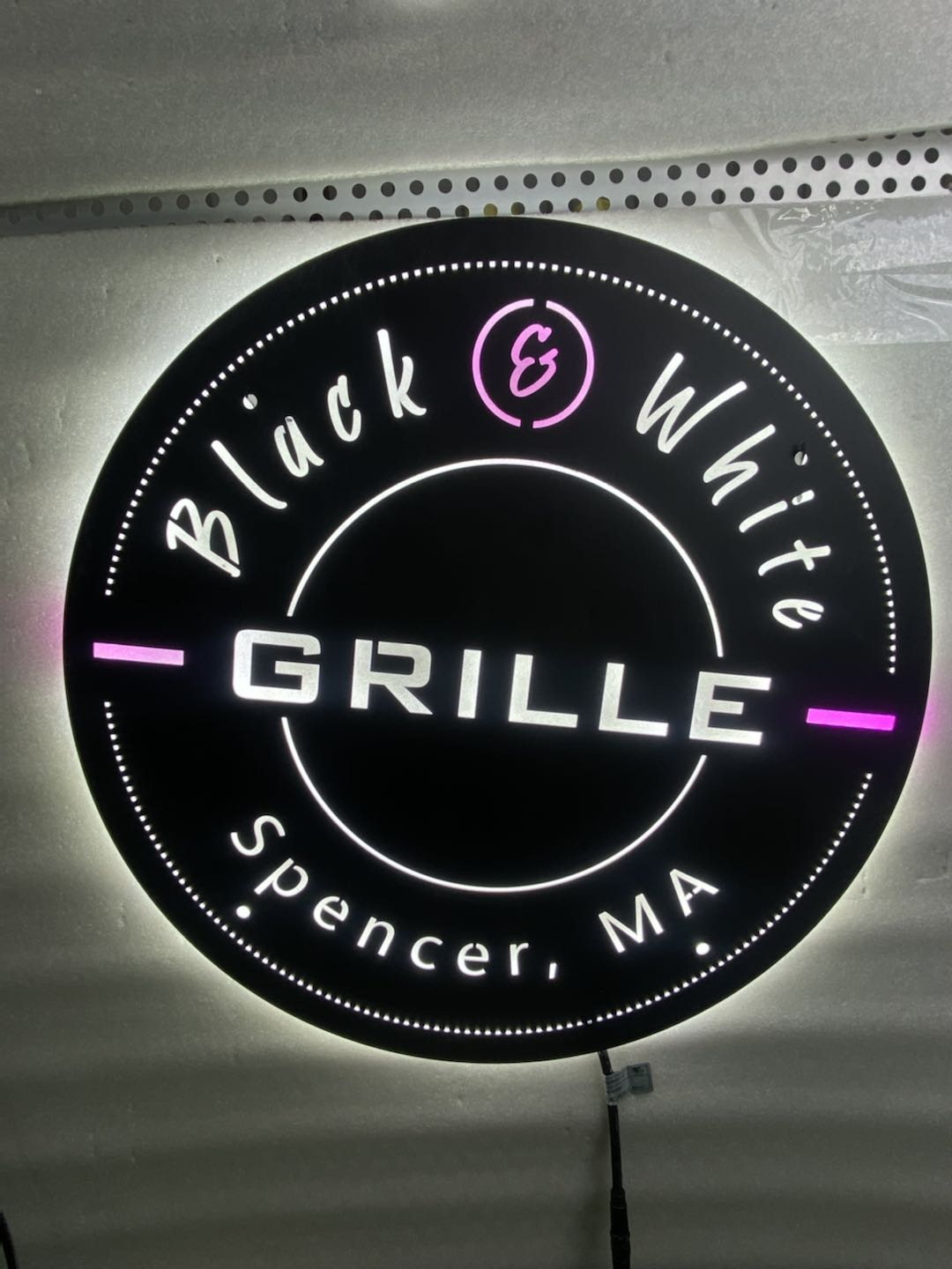 black and white grille metal sign for restaurants and bars
