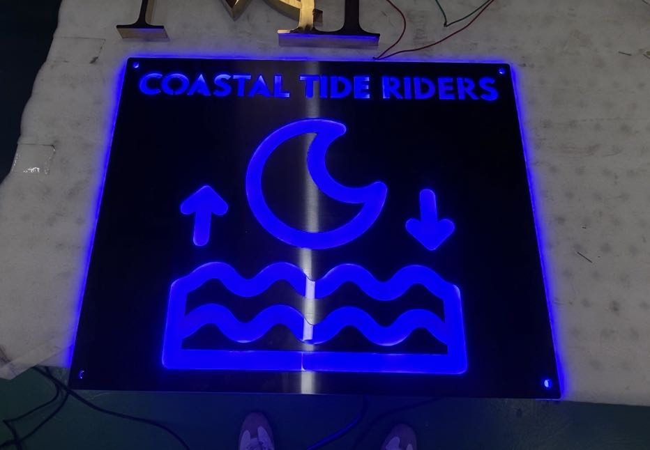 coastal tide riders metal retail sign display