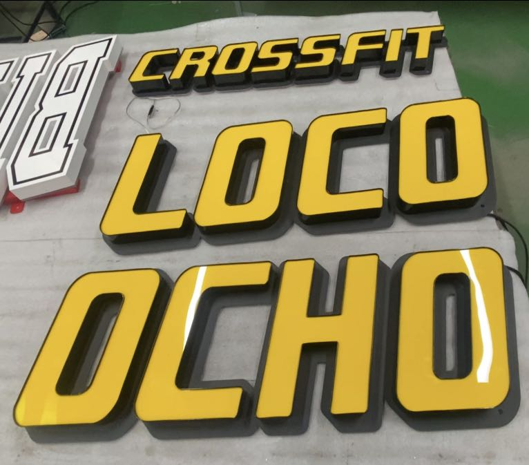 crossfit loco ocho sports fitness gym with custom metal signs