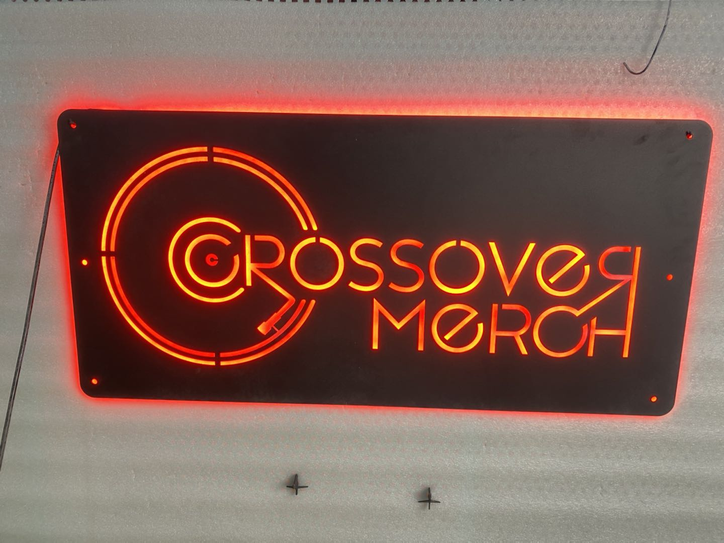 crossover merch retail metal signs display for church branding and decor