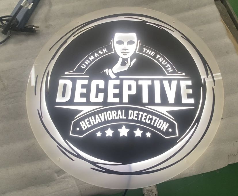 metal sign displaying deceptive education message