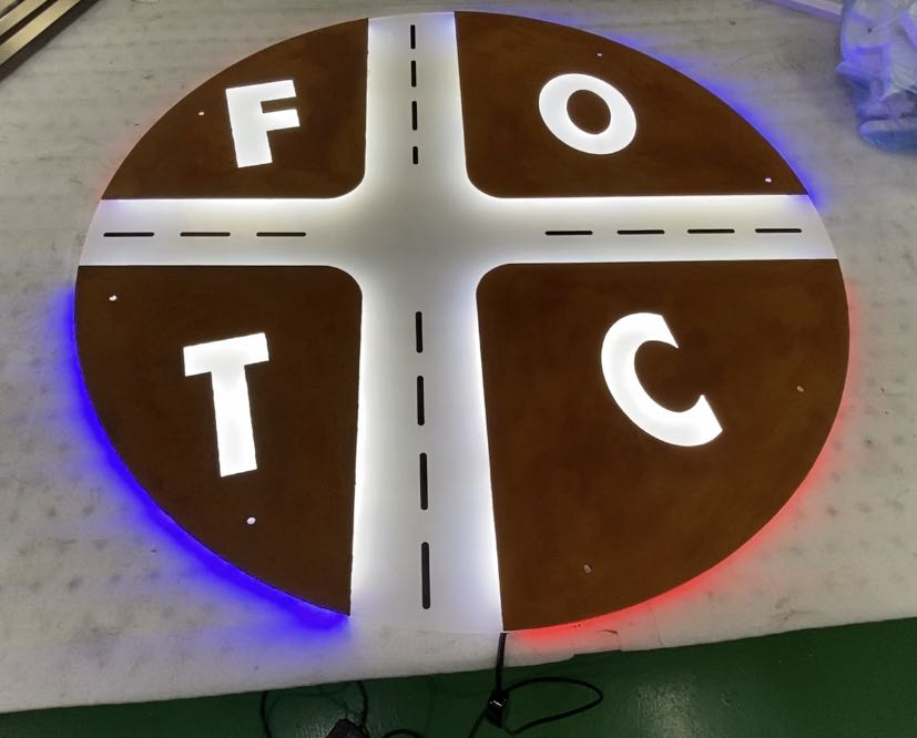 custom metal sign for fotc personal services business