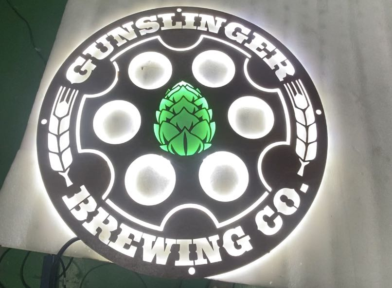 gunslinger brewing co agriculture themed metal sign