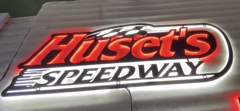 huset's speedway automotive metal sign