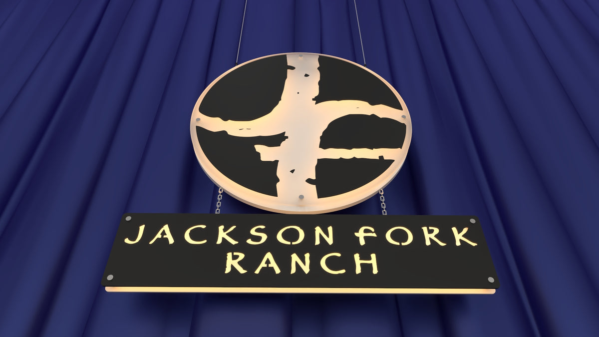 metal signs featuring jackson fork ranch logo and agricultural motif