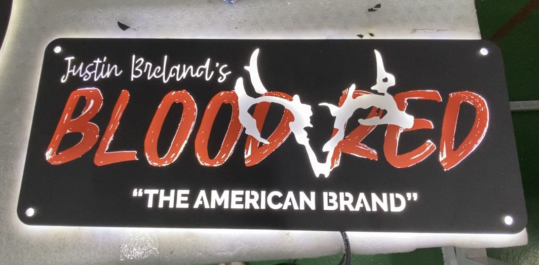 bloodred metal sign for personal services by justin breland