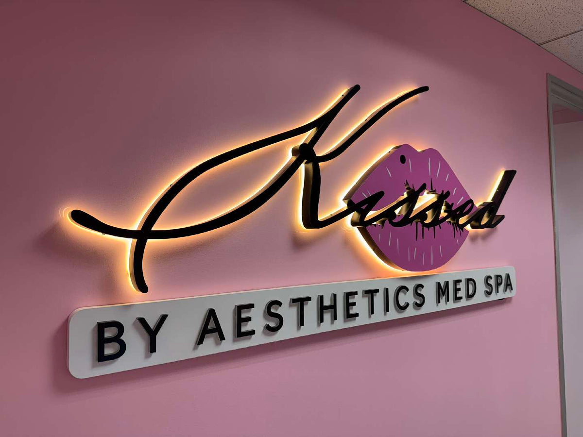 3d healthcare sign for kissed by aesthetics displaying modern medical branding