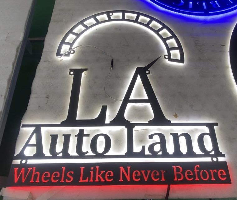 la auto land automotive and metal signs display for car enthusiasts and collectors