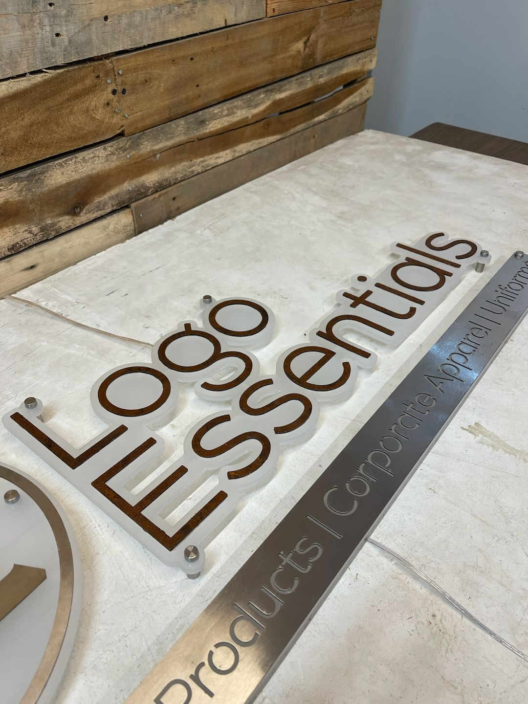 Signefo Logo Afcultures custom sign for Logo Essentials LLC – AFCultures