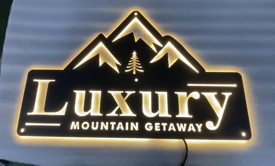luxury mountain getaway hospitality metal signs for cabins and lodges