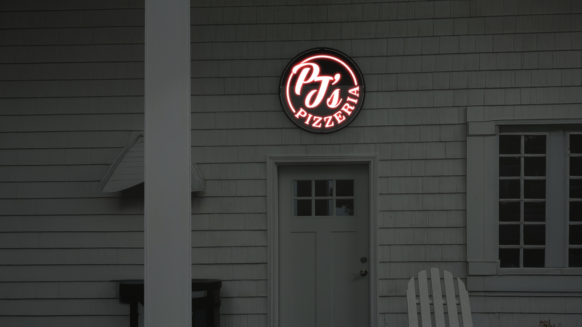 3d sign for pjs pizzeria displayed on restaurant and bar exterior