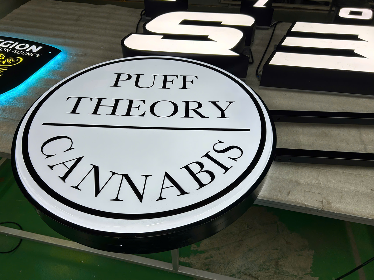 puff theory cannabis retail storefront with custom 3d signage