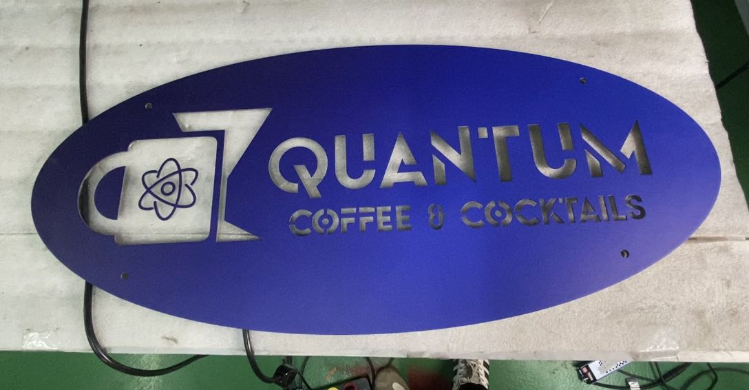 metal sign for quantum restaurants and bars