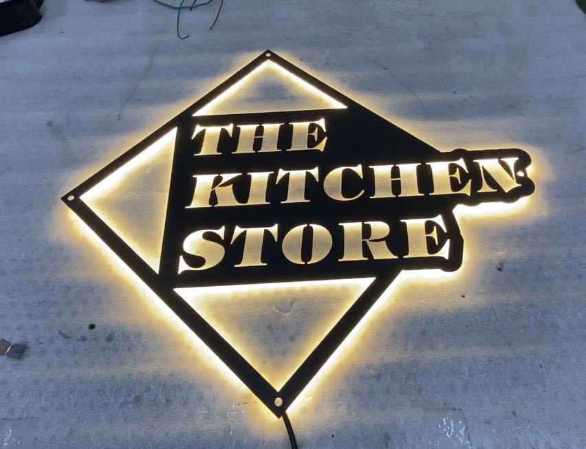 metal signs display at the kitchen store retail location