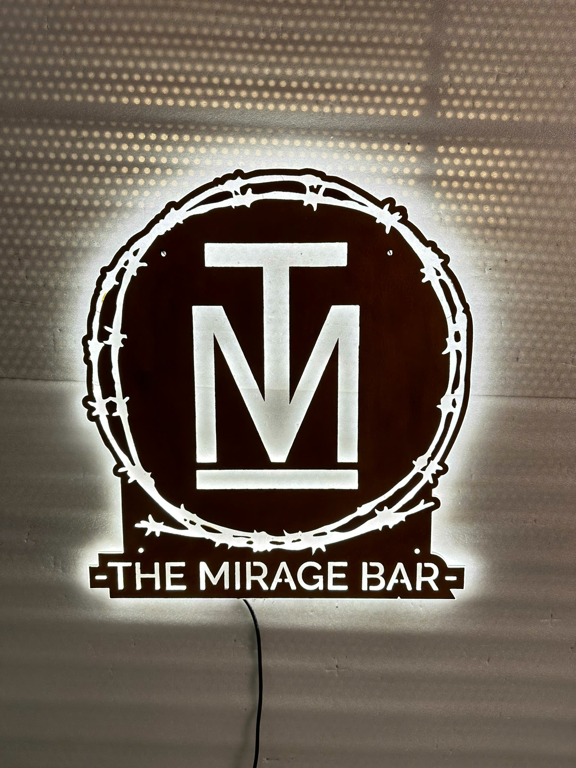 metal signs at the mirage showcasing restaurants and bars