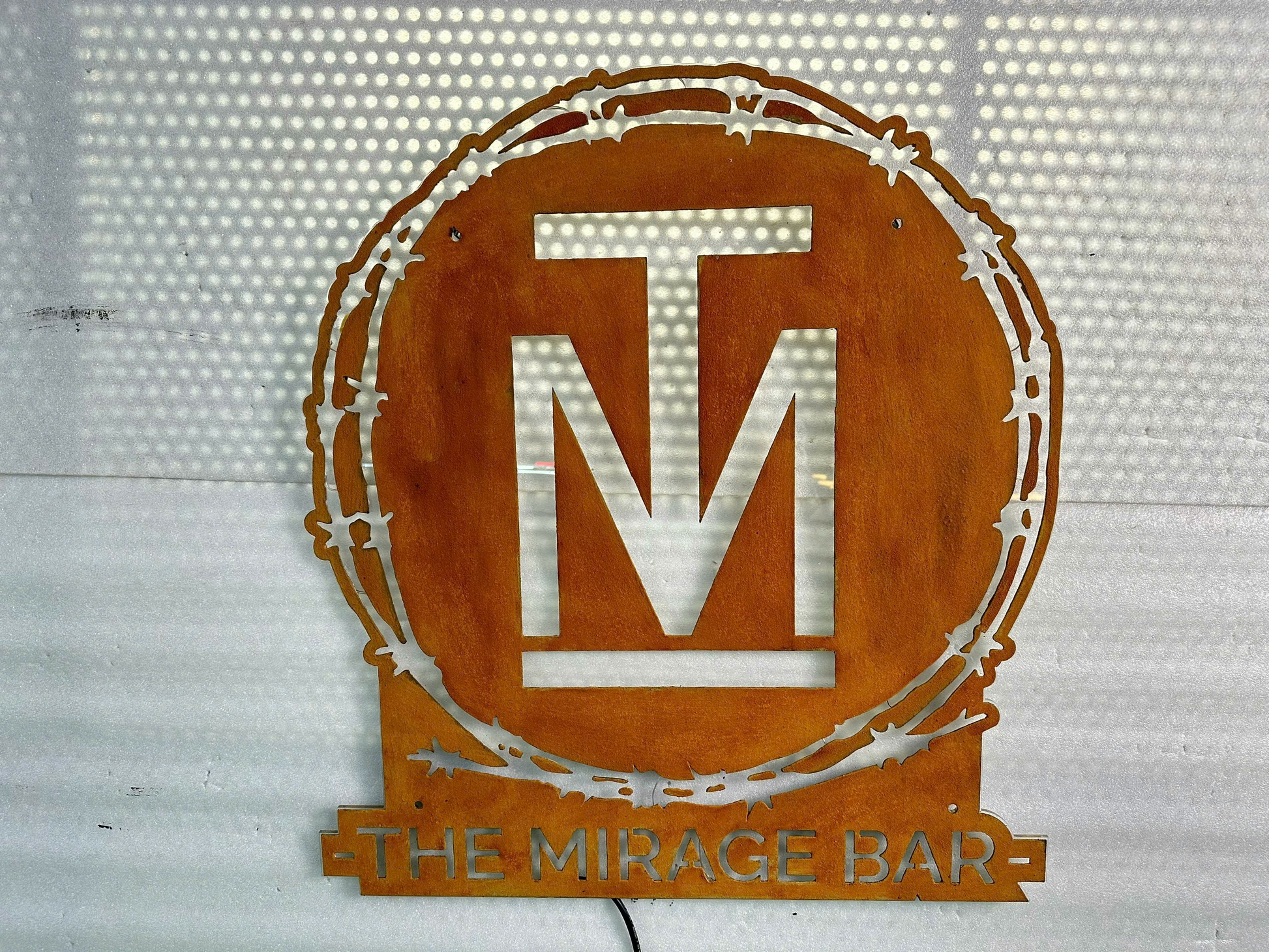 metal signs for the mirage restaurants and bars
