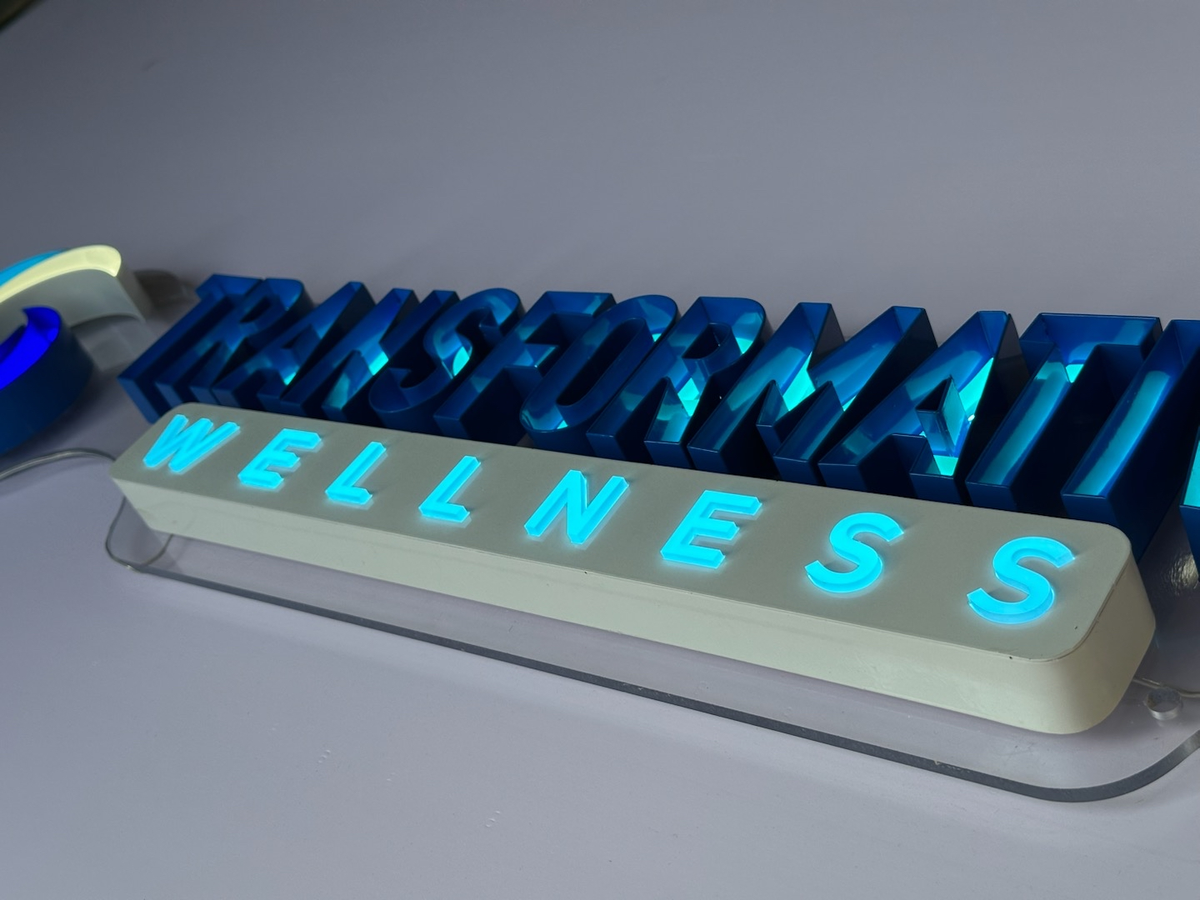 transformative wellness healthcare metal signs