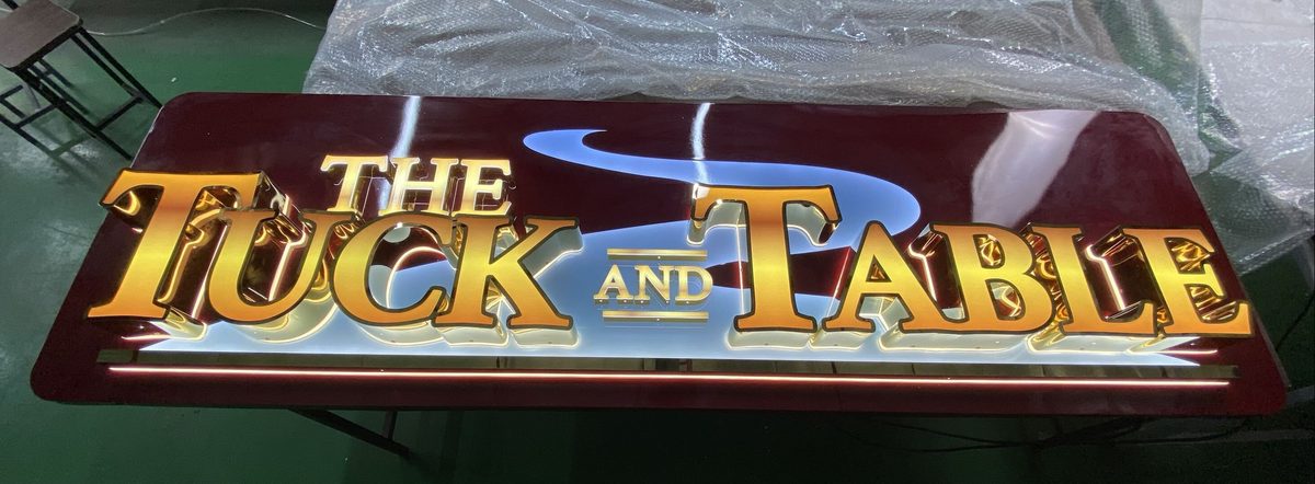 tuck and table restaurant and bar 3d sign exterior